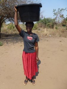 Mildred Carrying Water